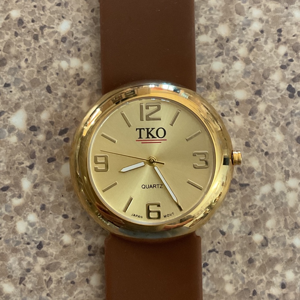 TKO Gold Dial woman’s Watch with Brown Snap Strap